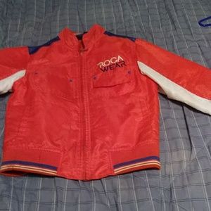 Orange coat roca wear